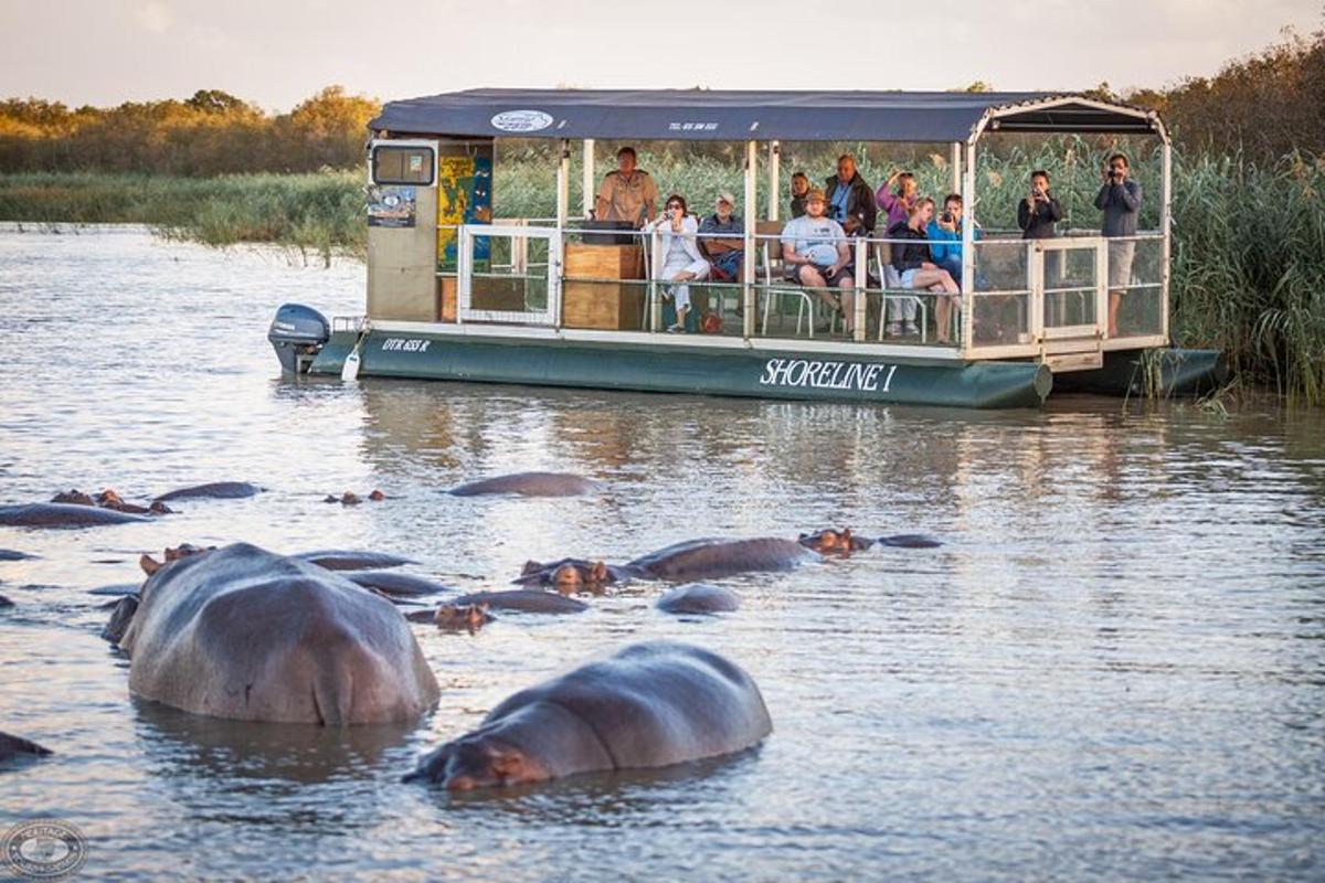 a group of people on a boat in the water