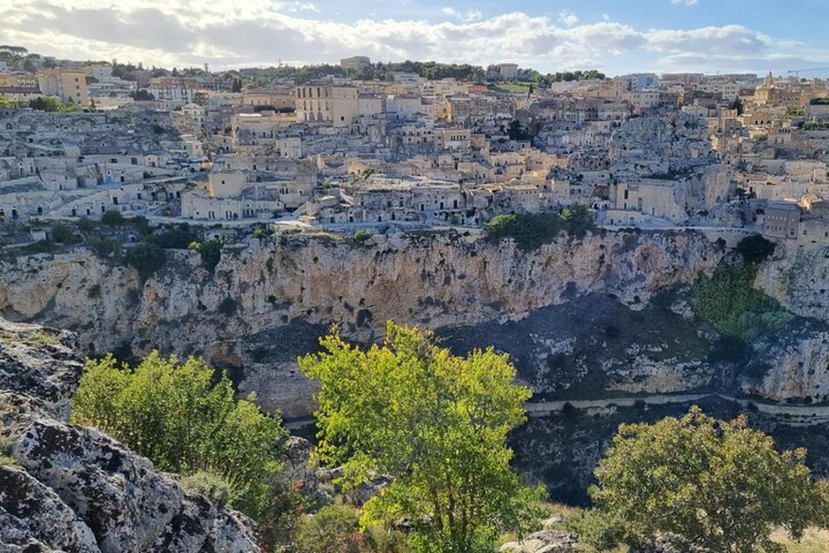 a view of a city on a cliff