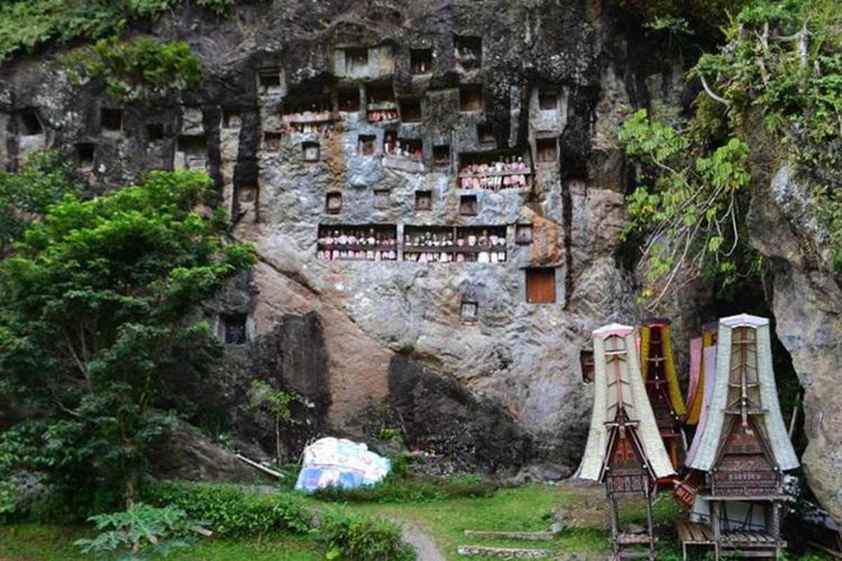 a building on the side of a rocky mountain