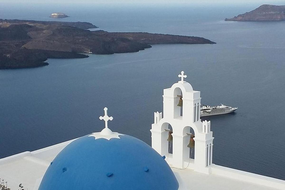 a white church with a cross on top of it