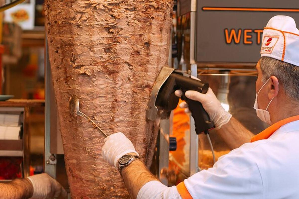 a man is taking a picture of a tree