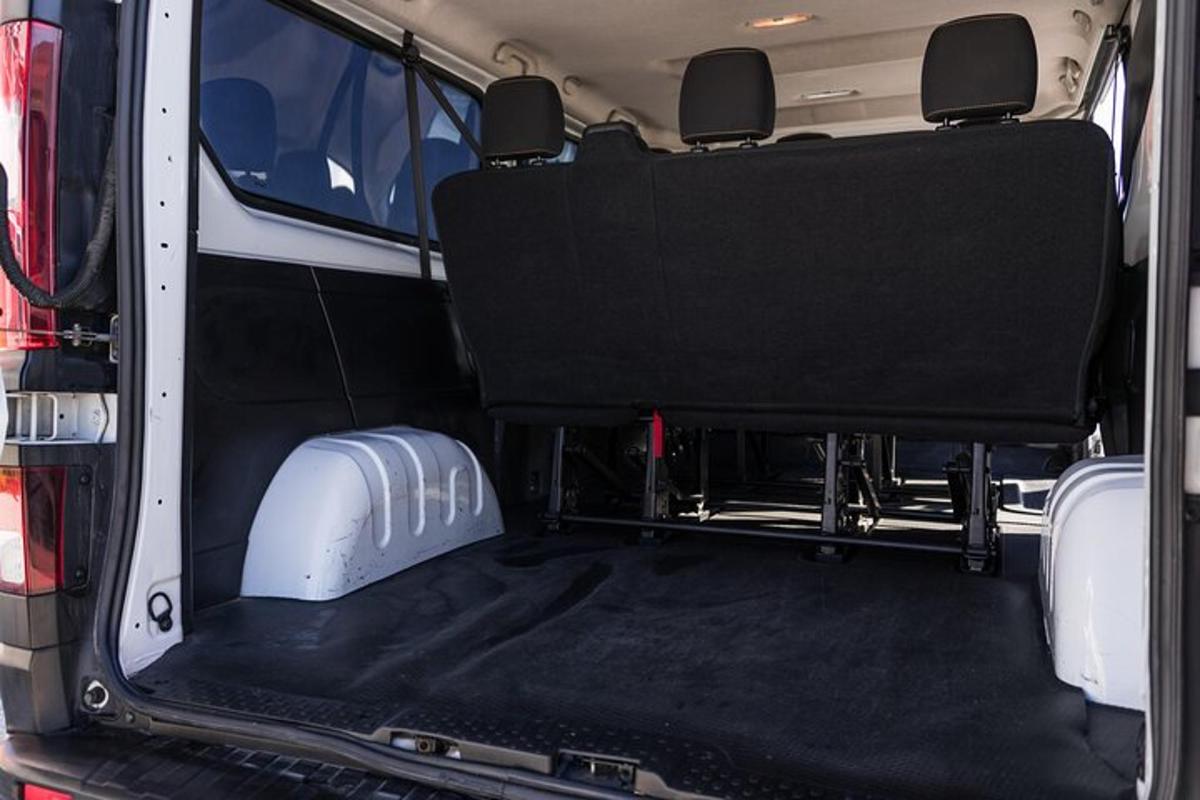 isang bukas na upuan sa likod ng isang van na may back seatservation