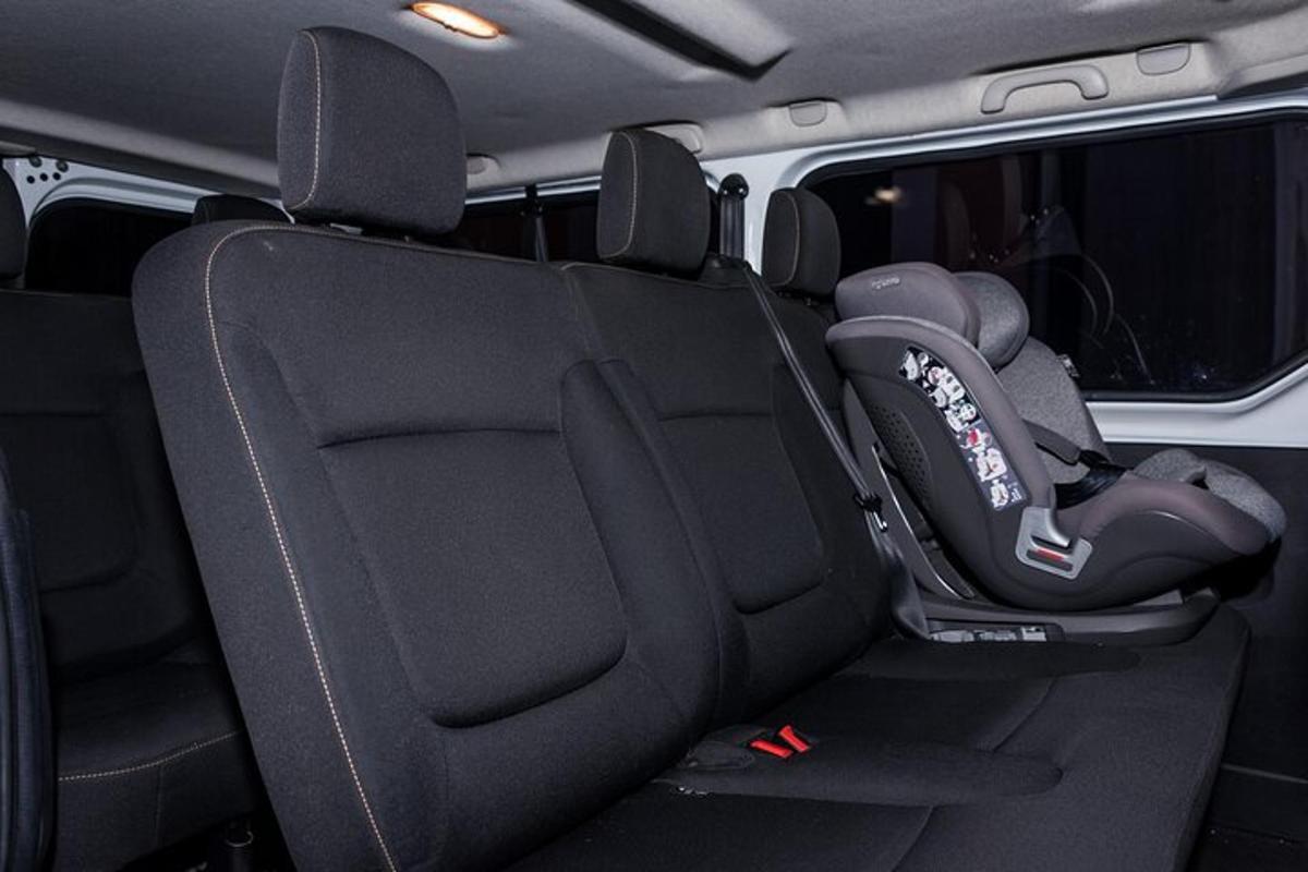 a car seat in the back of a vehicle