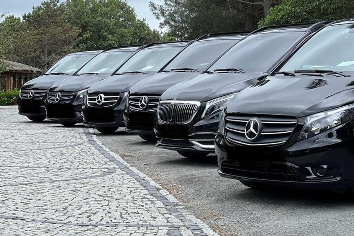 a row of cars parked in a parking lot