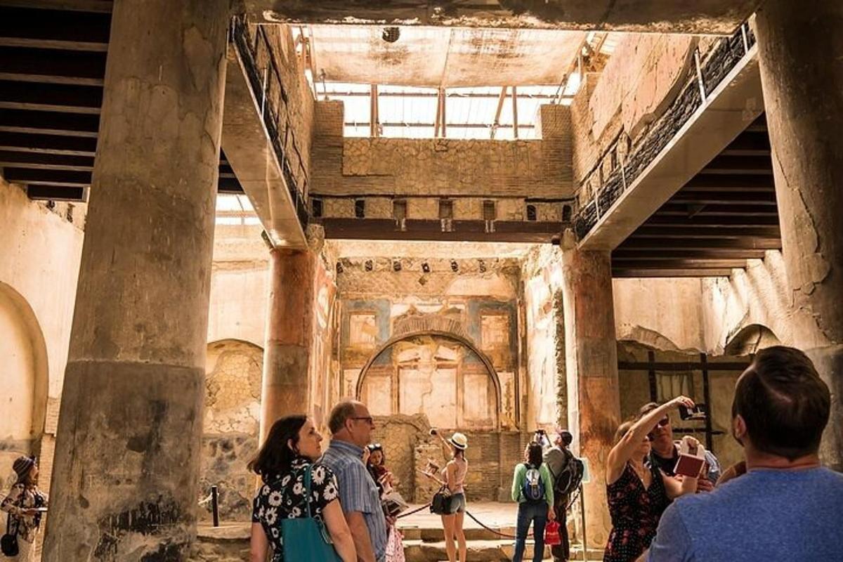 a group of people standing inside of a building