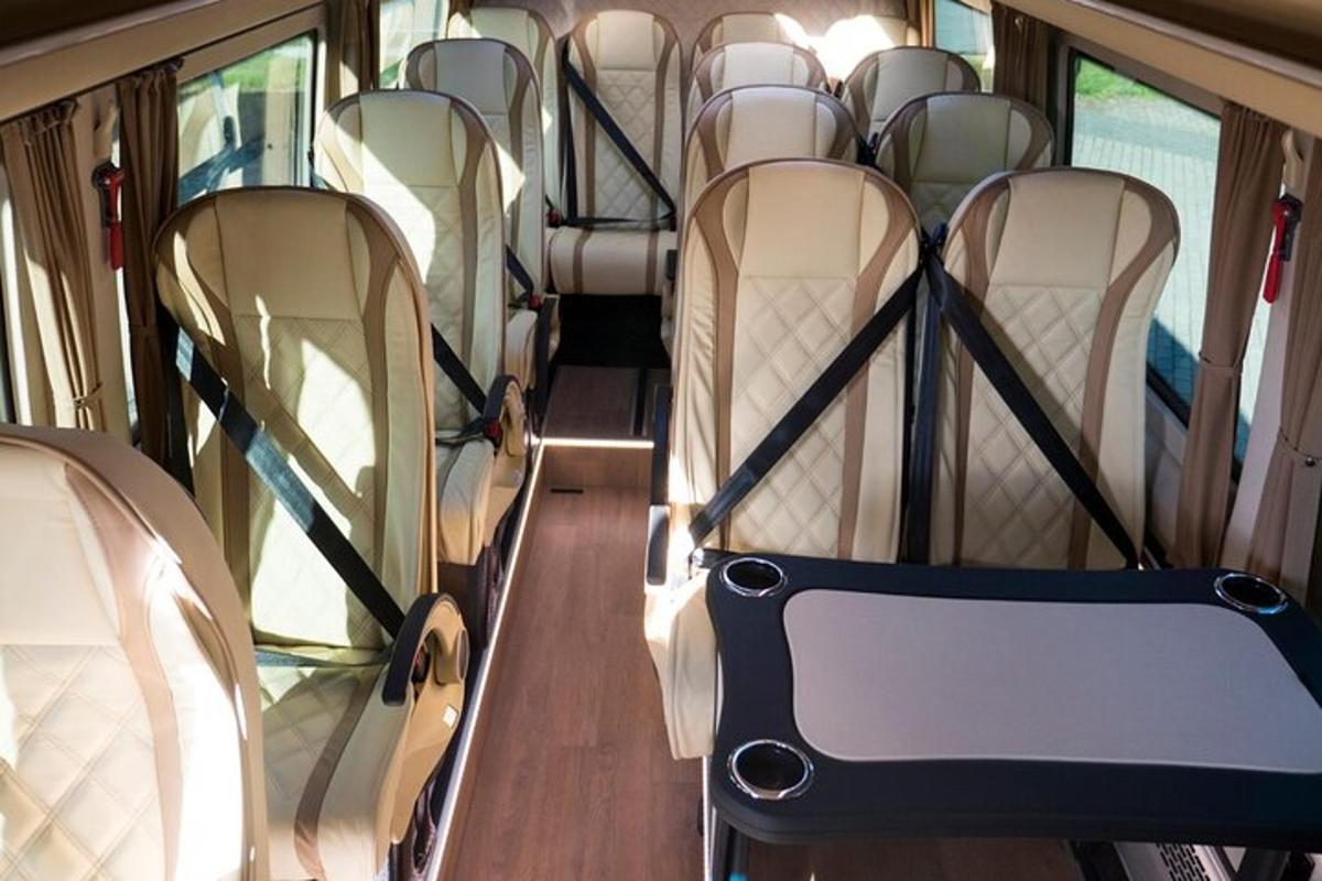 an empty bus with empty seats on a bus