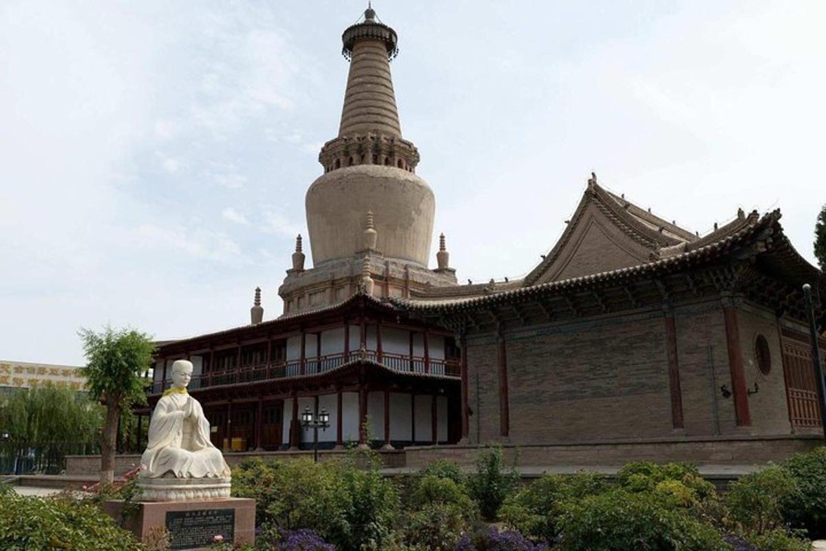 a building with a statue in front of it
