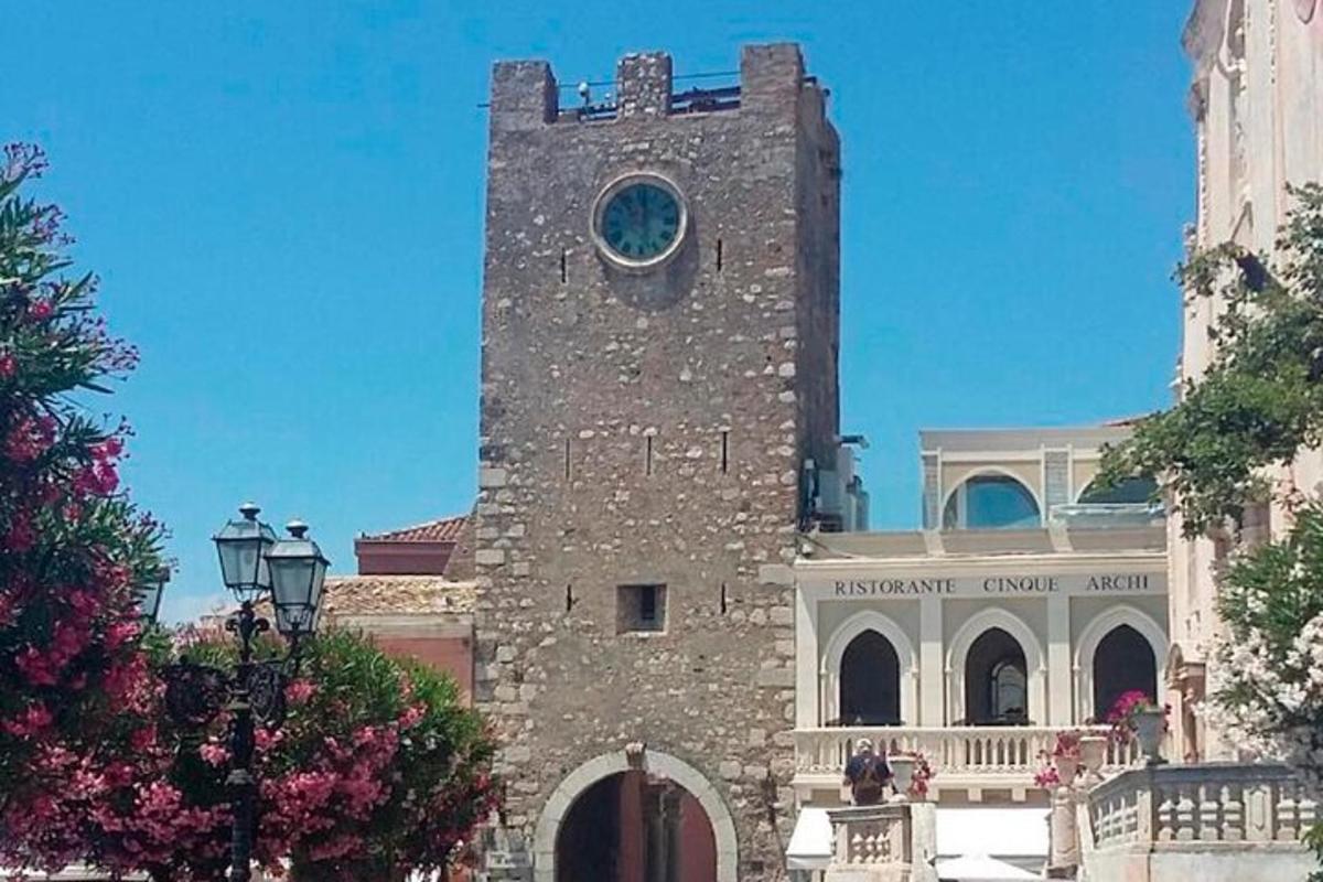 a building with a tower with a clock on it