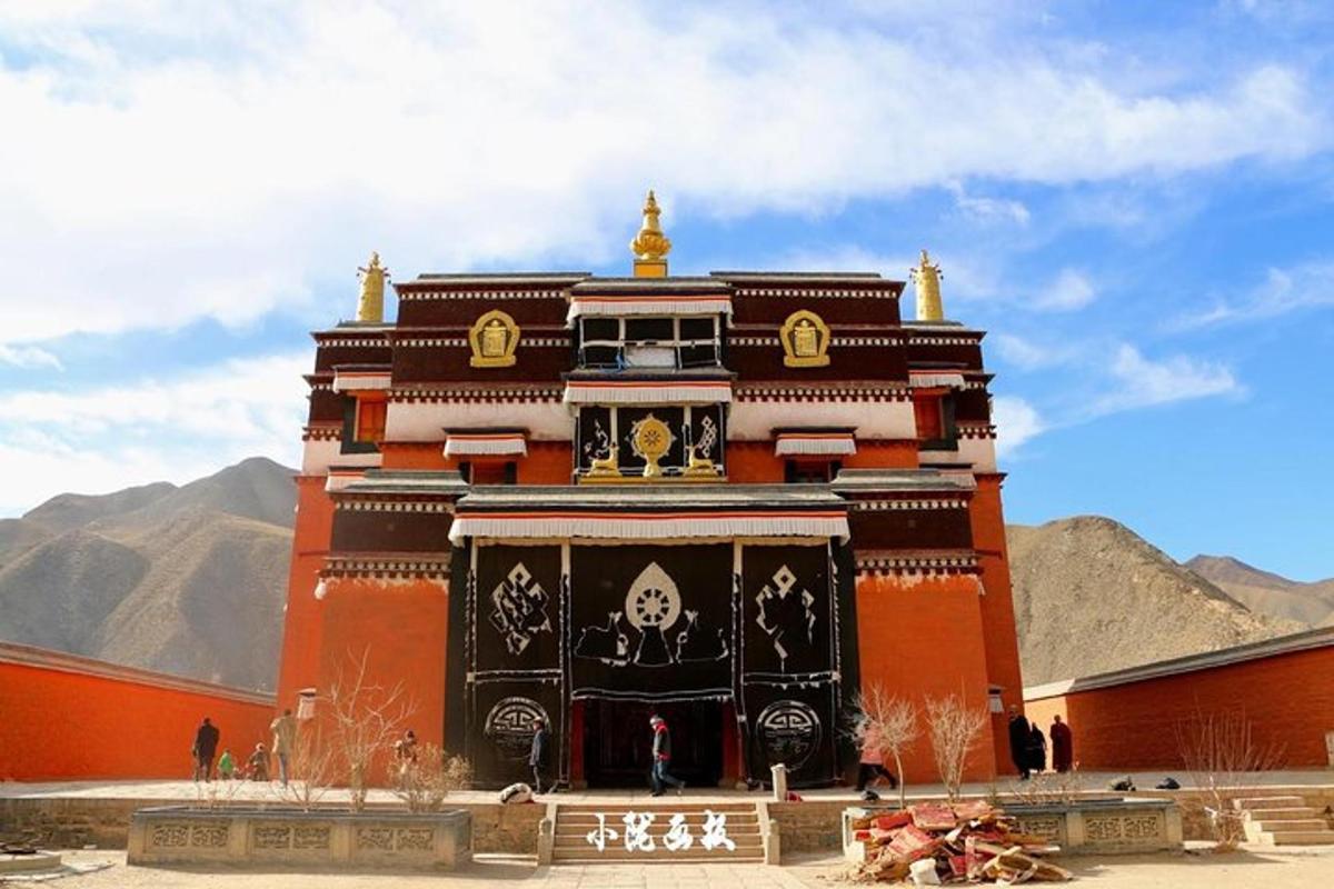 a large red building with a black and gold