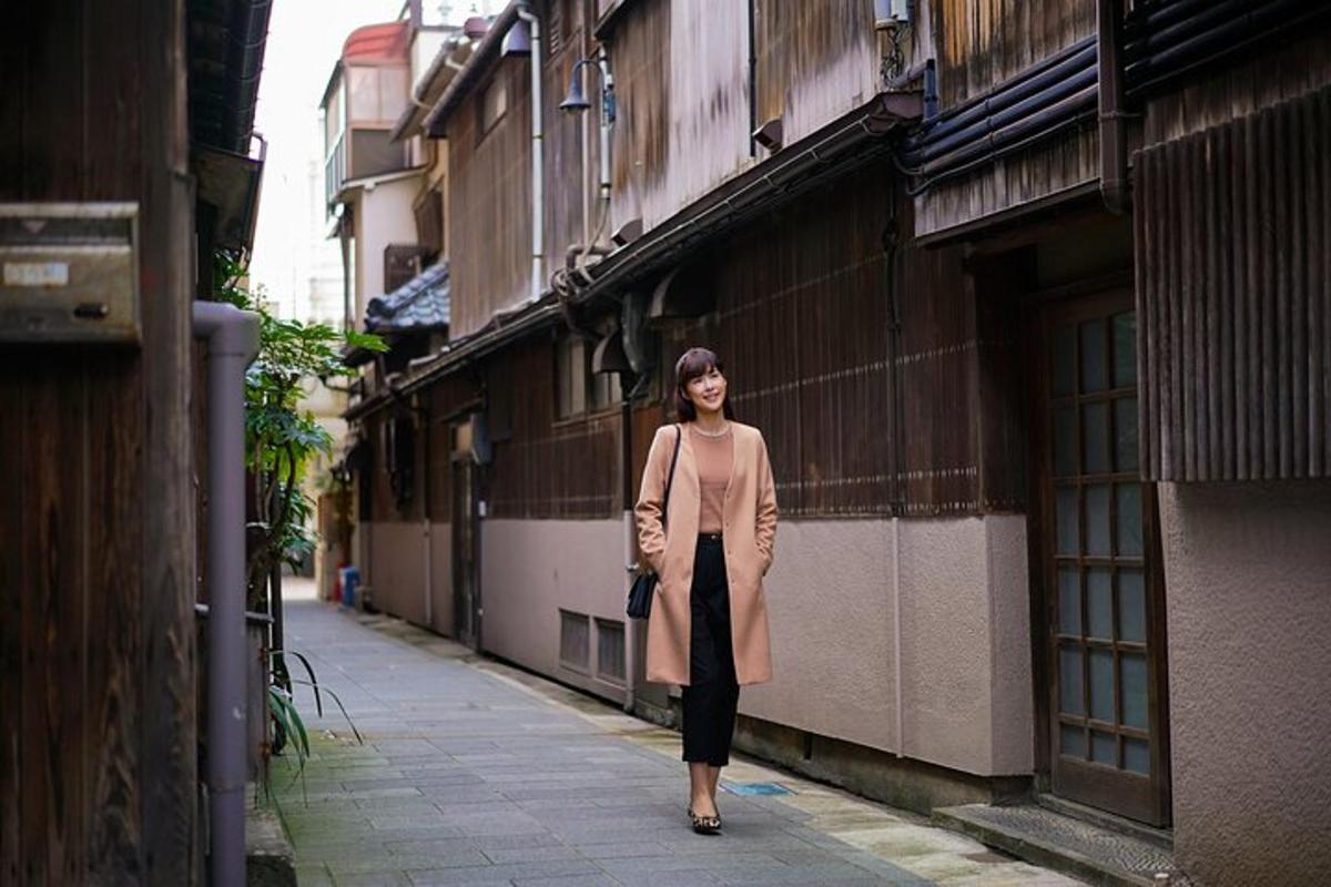 a woman is walking down a street