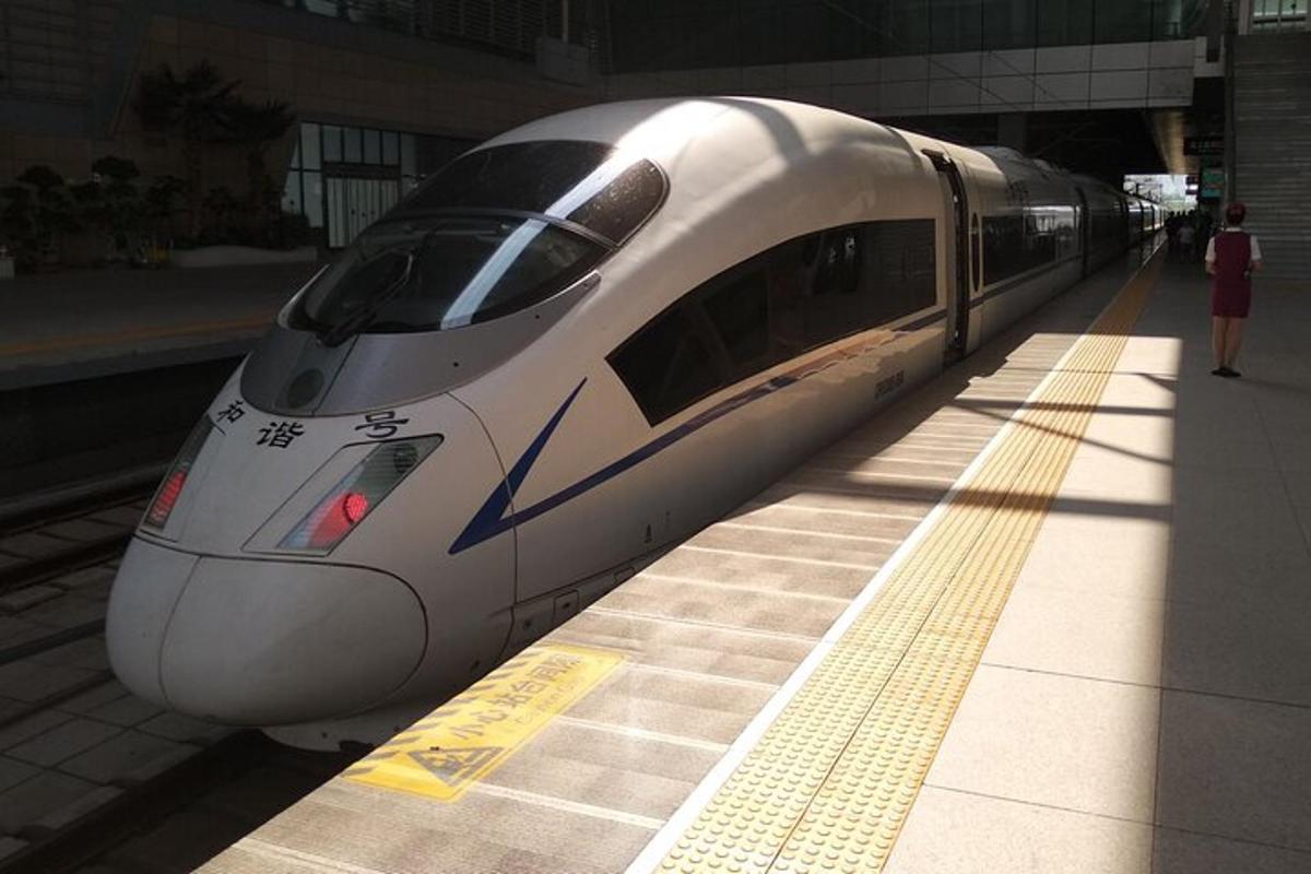 a bullet train is parked at a train station