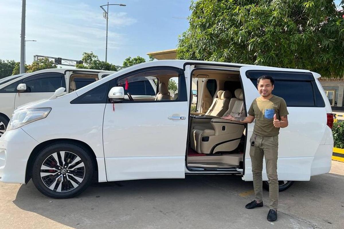 a man standing in front of a white van