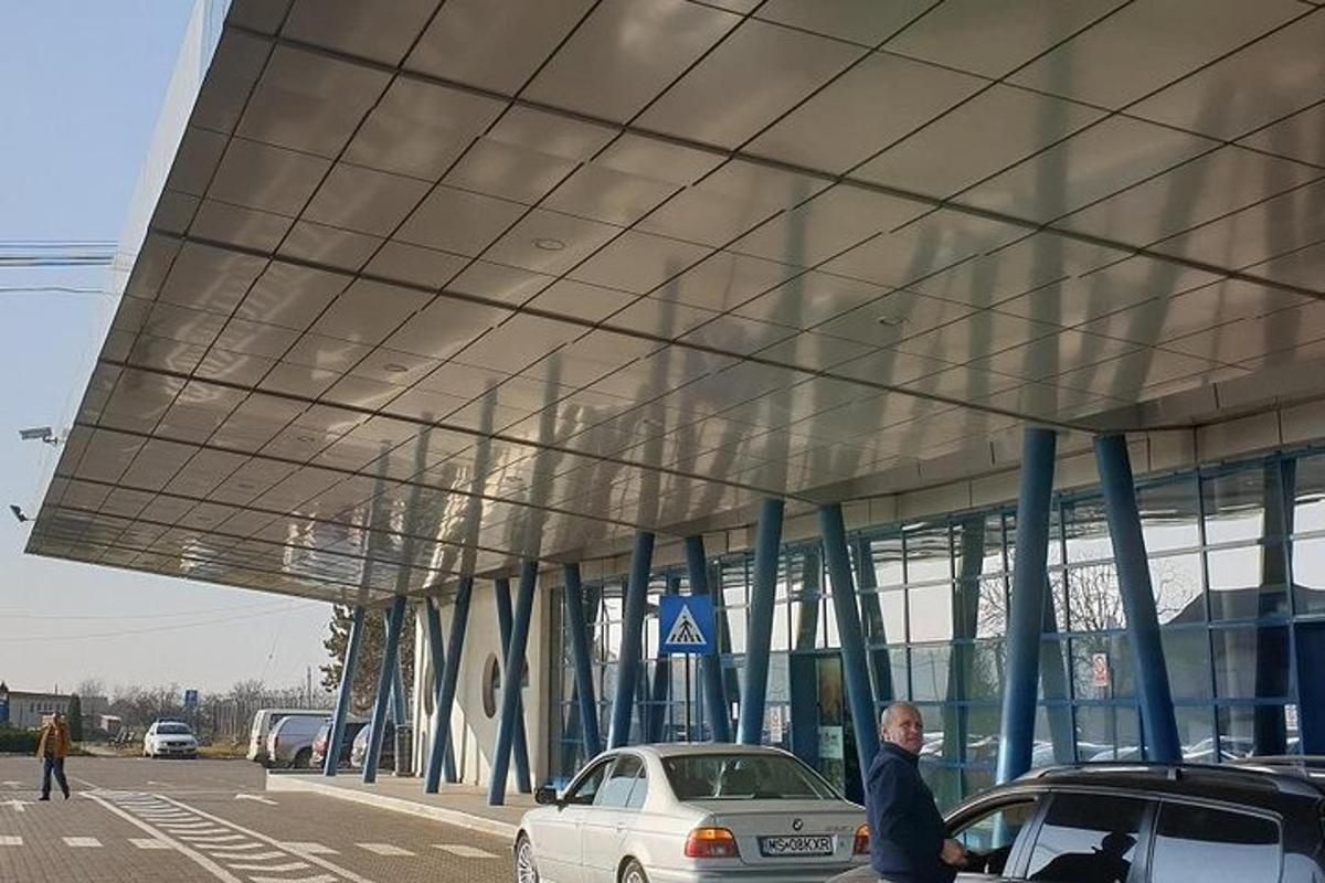 a building with cars parked in front of it