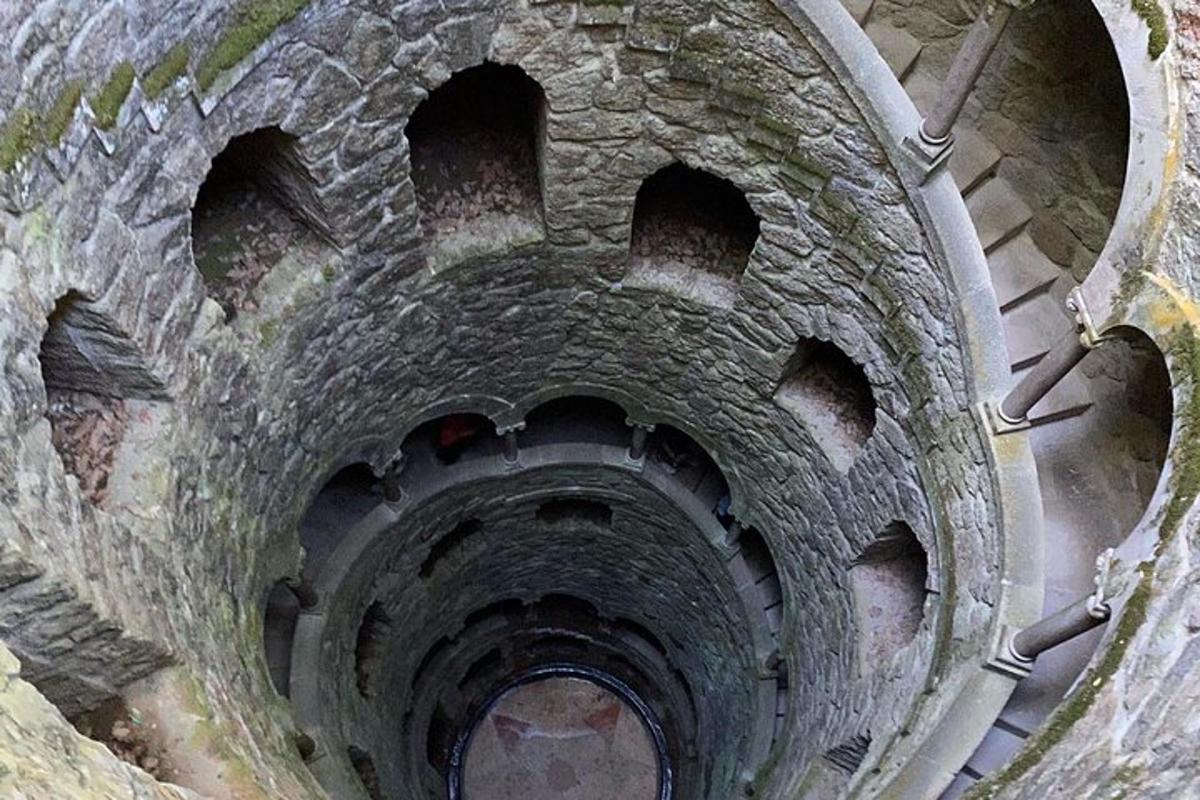 an overhead view of a tunnel withholes in the rocks