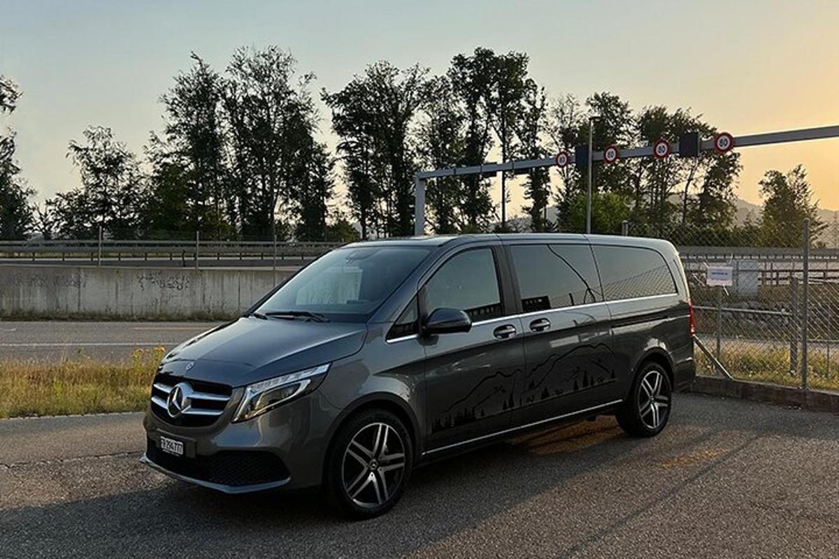 a black van parked on the side of a road