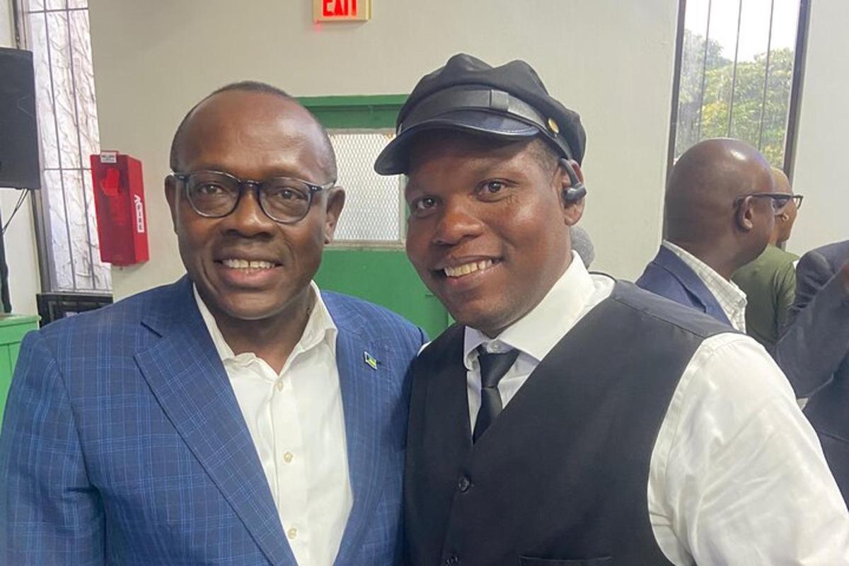two men are standing next to each other