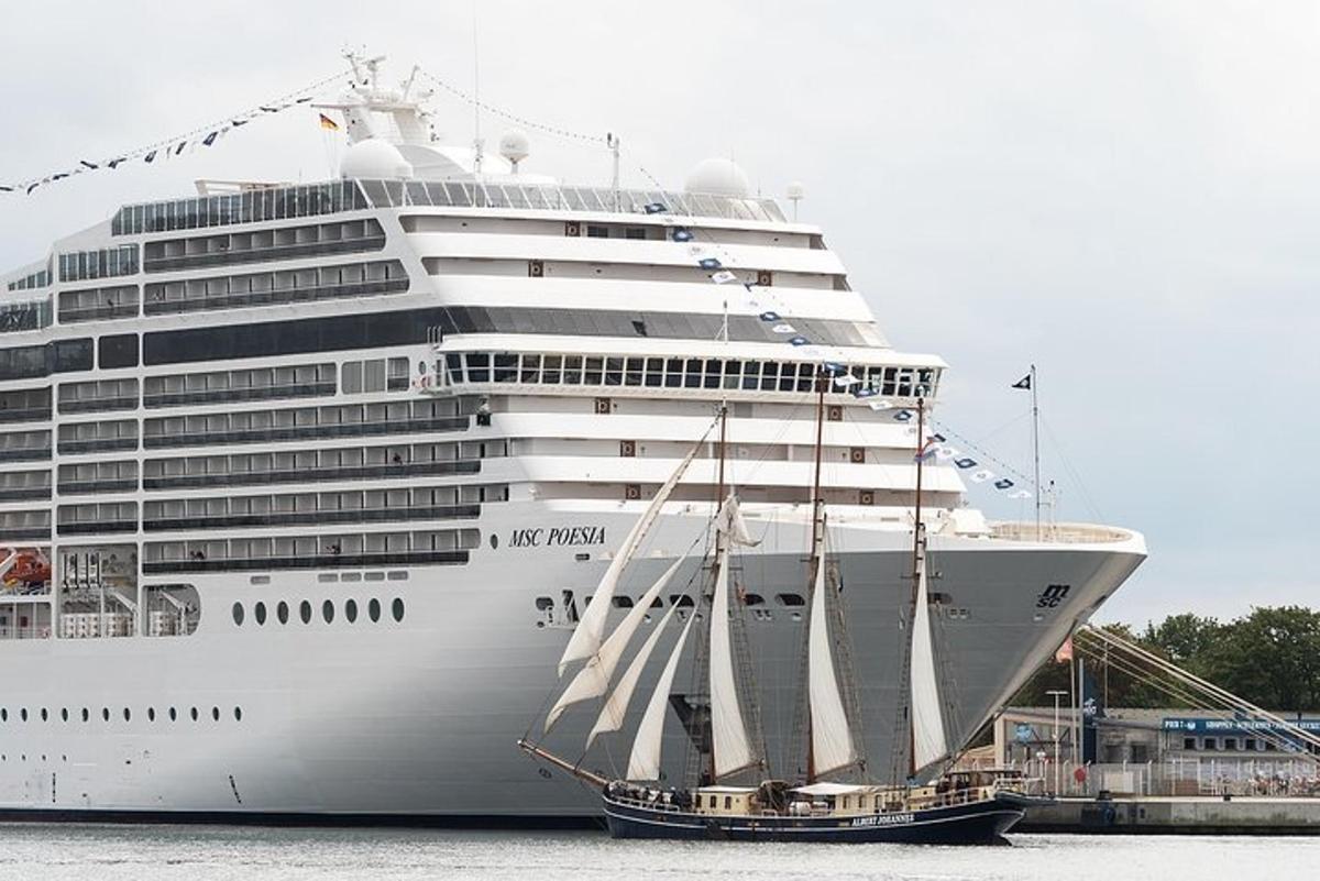 a large cruise ship is docked in the water