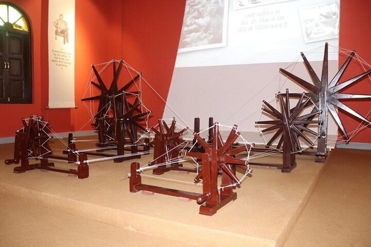 a group of windmills on display in a room