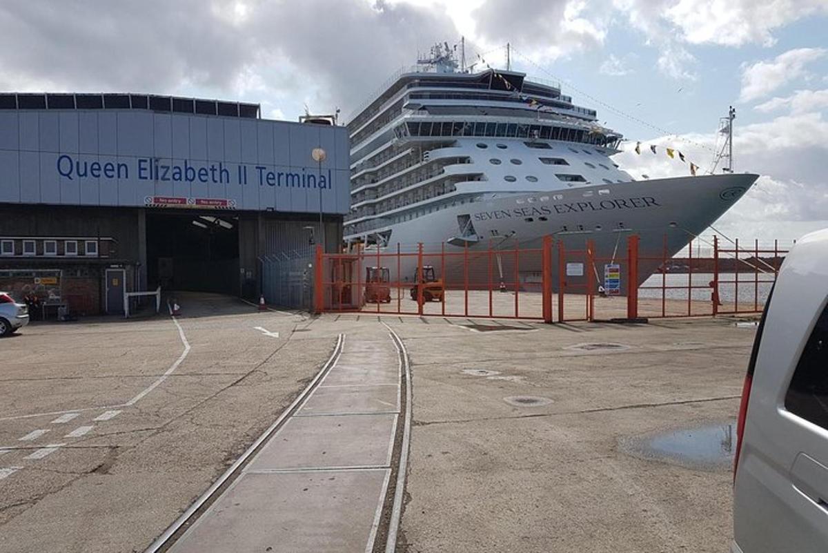 a cruise ship is docked at a terminal