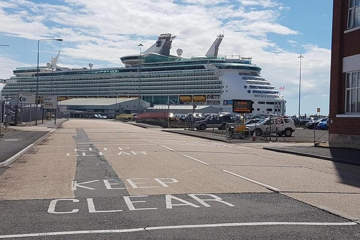 a large cruise ship parked in a parking lot
