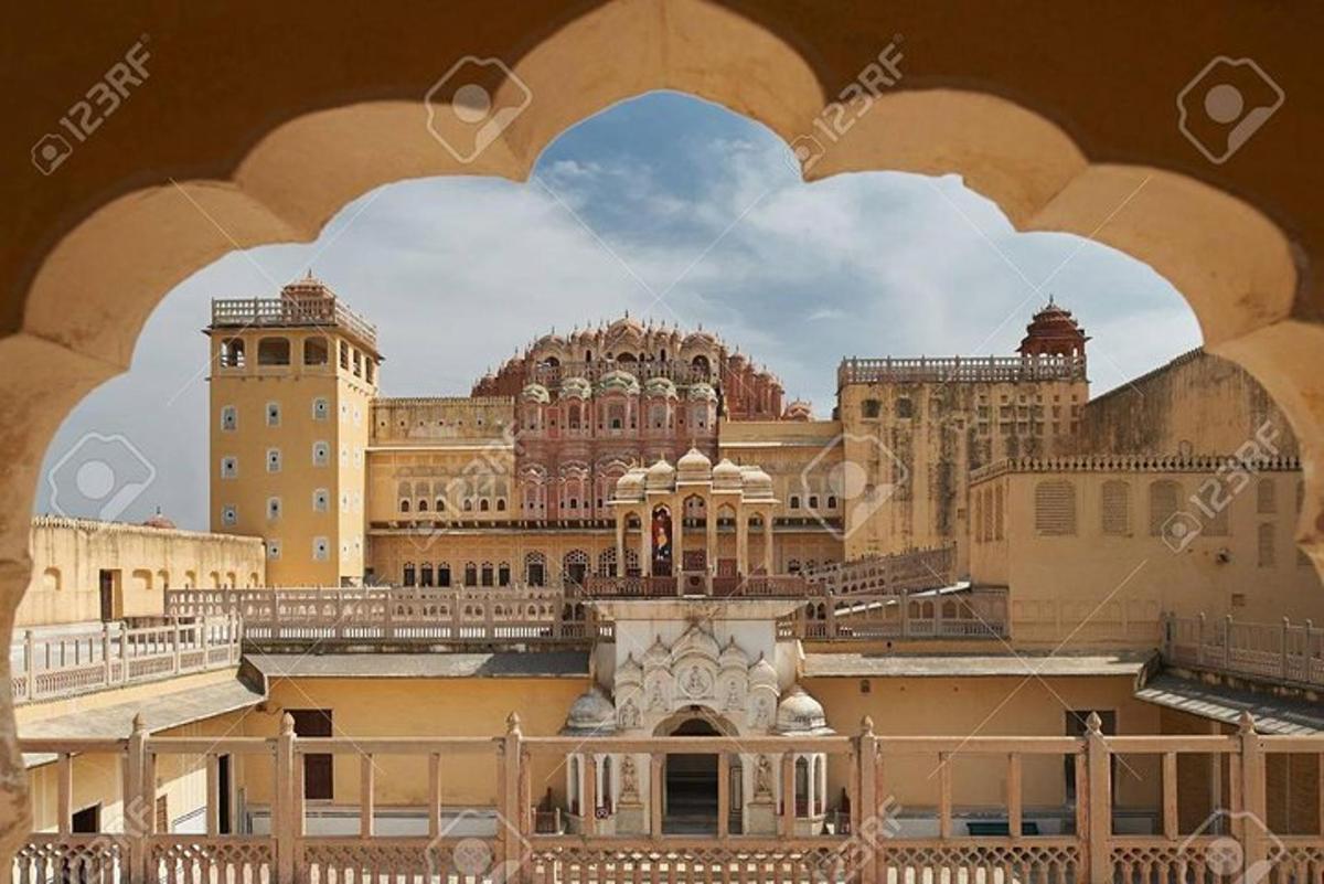 a view of the city through an archway stock photo