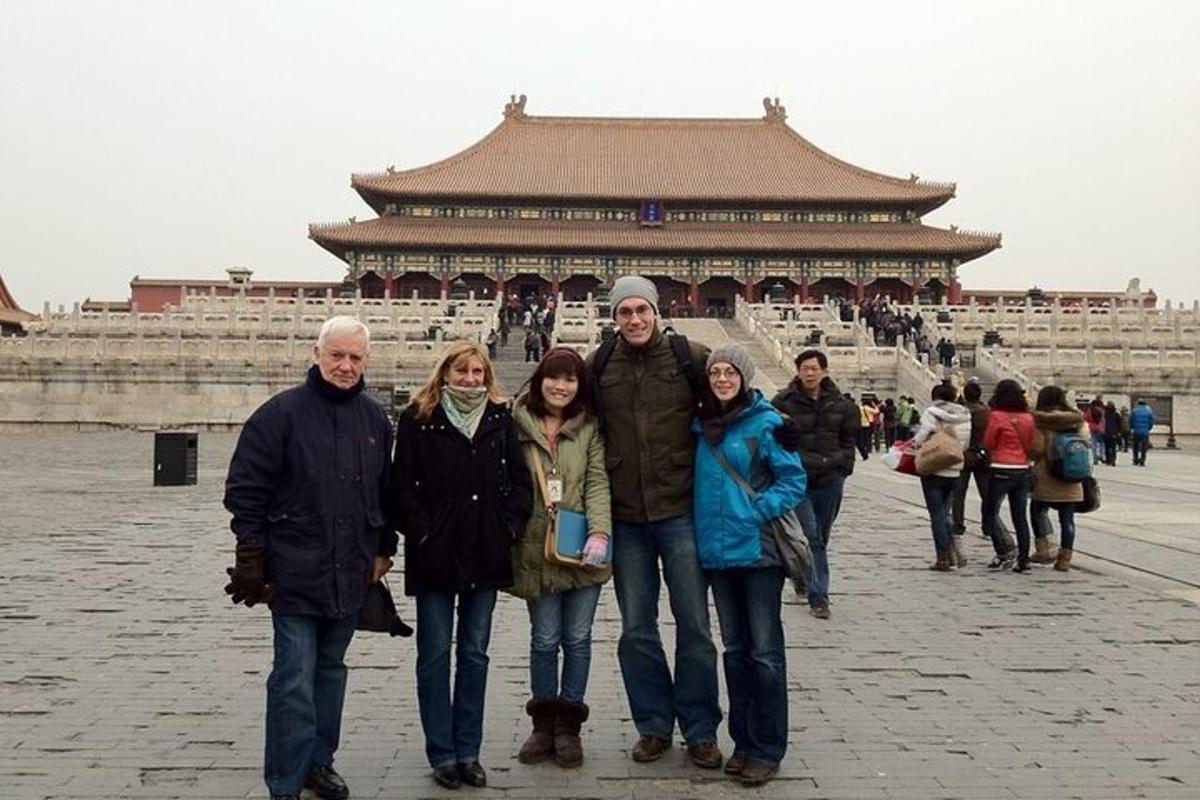 a group of people standing in front of a building