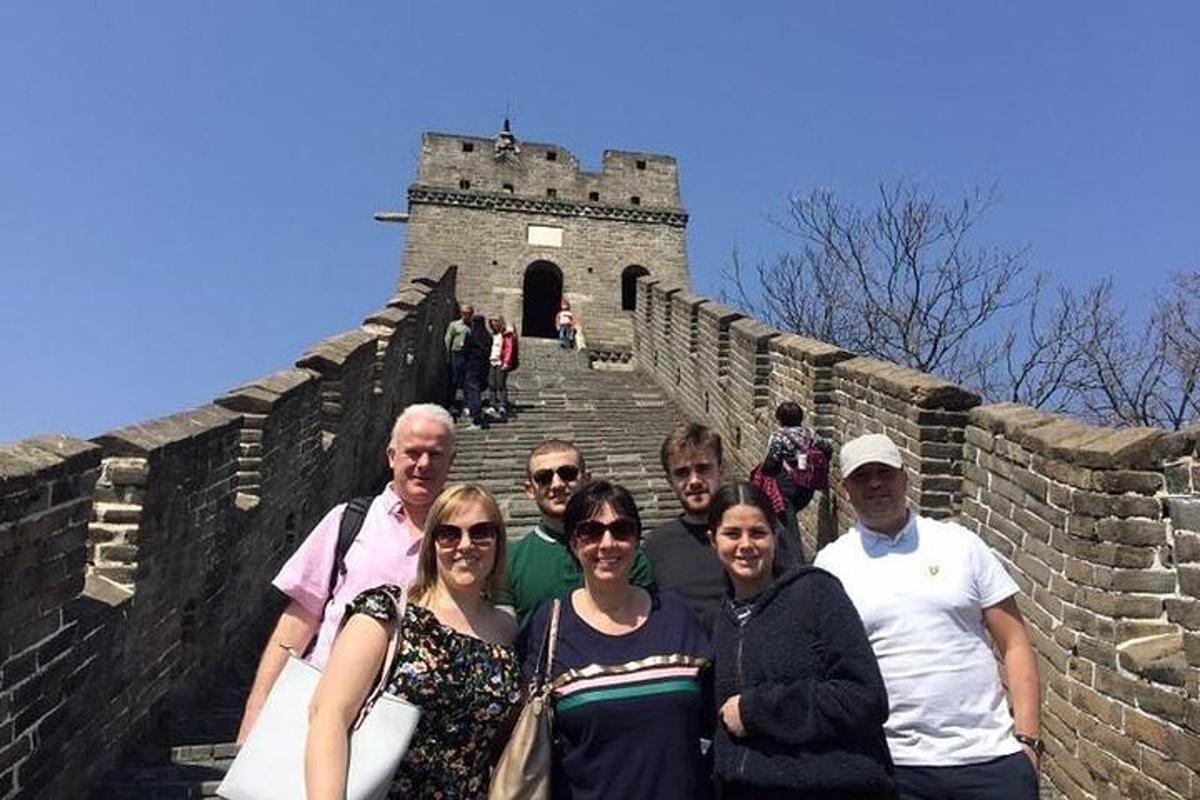 a group of people standing on the great wall