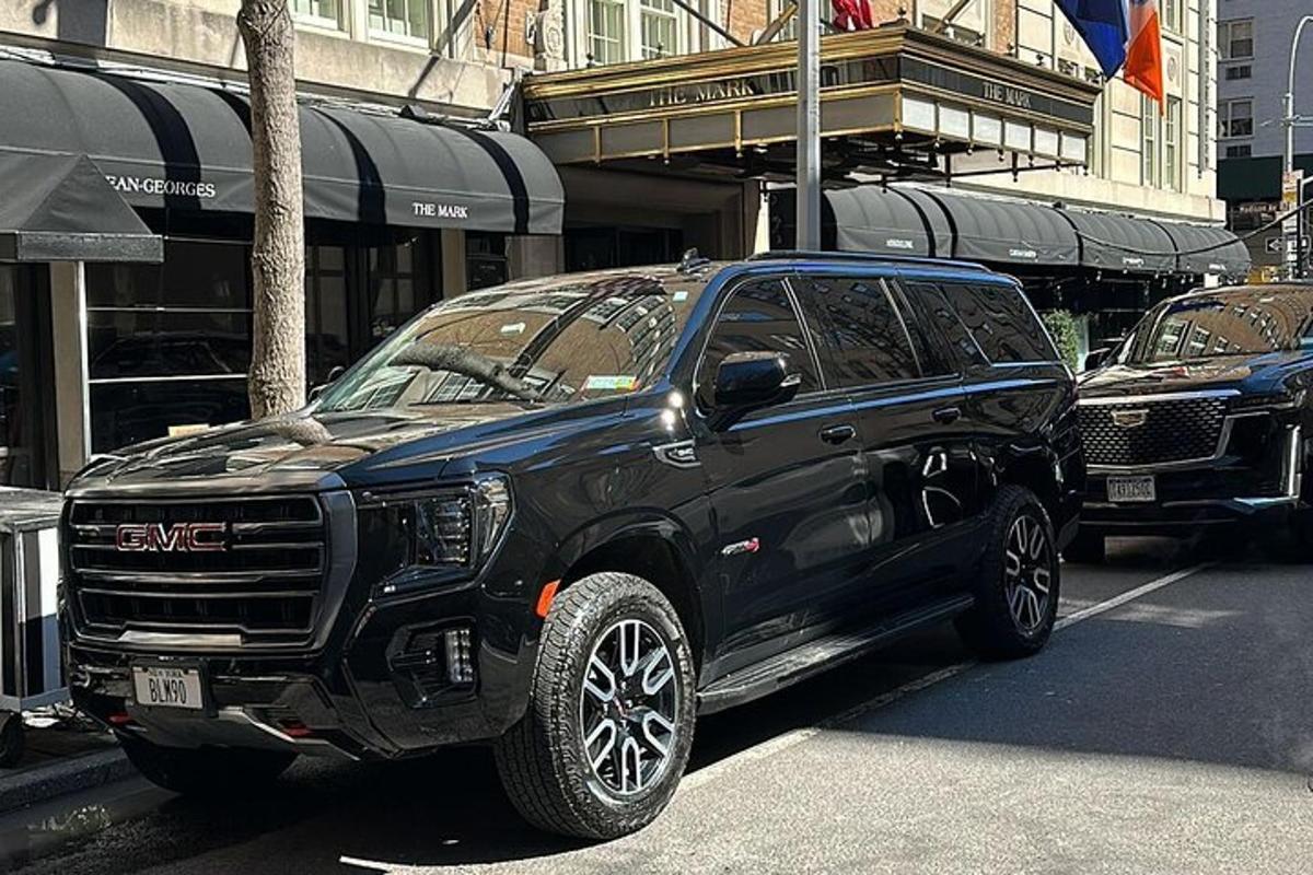a black truck parked in a parking lot