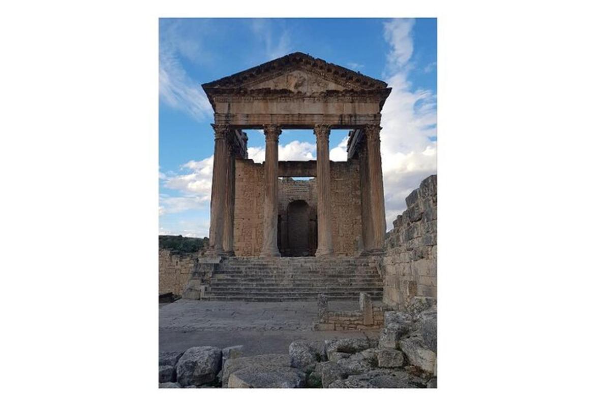an ancient temple on top of a hill
