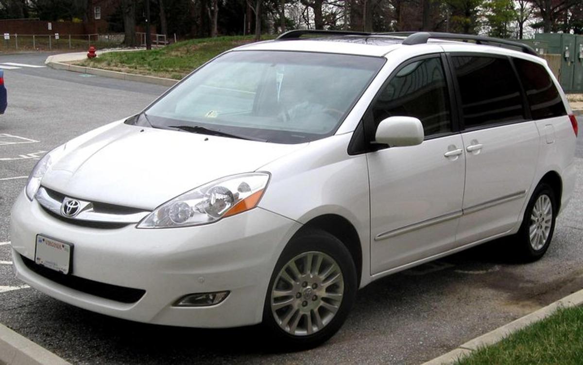 a white car parked in a parking lot