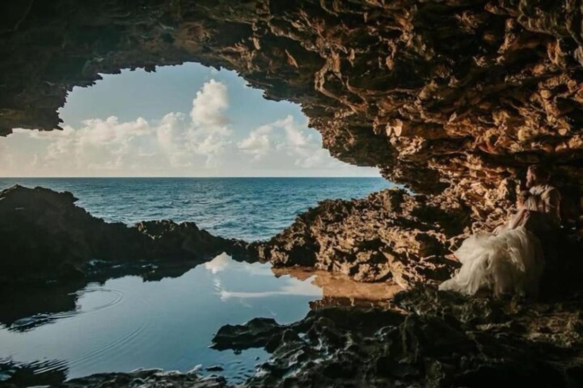 a view of the ocean from inside a cave