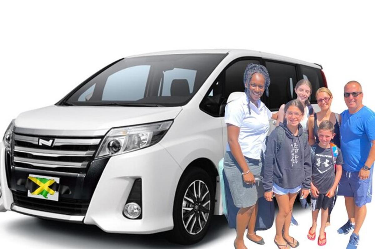 a group of people standing in front of a van