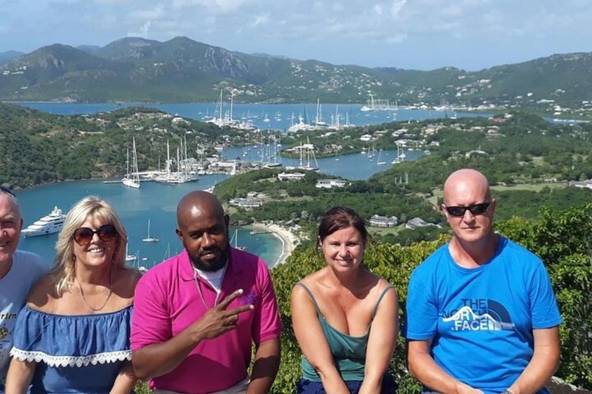 a group of people standing in front of a harbor