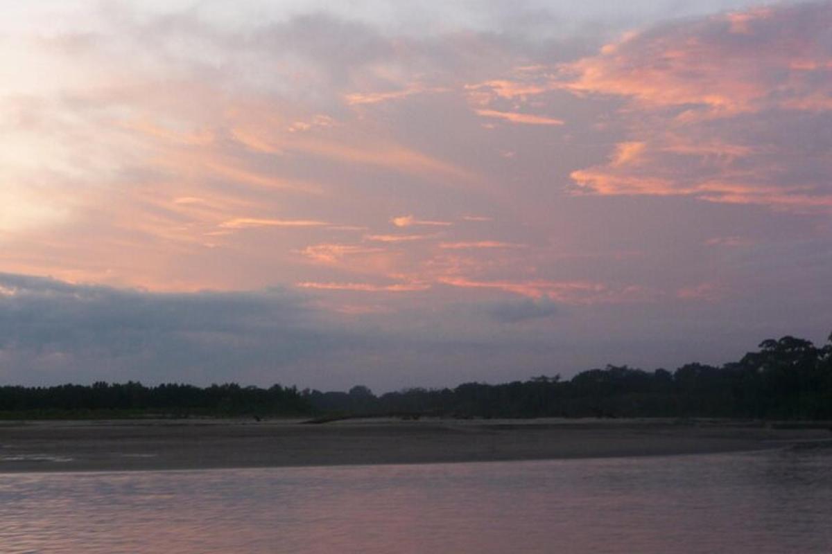 a sunset over a body of water