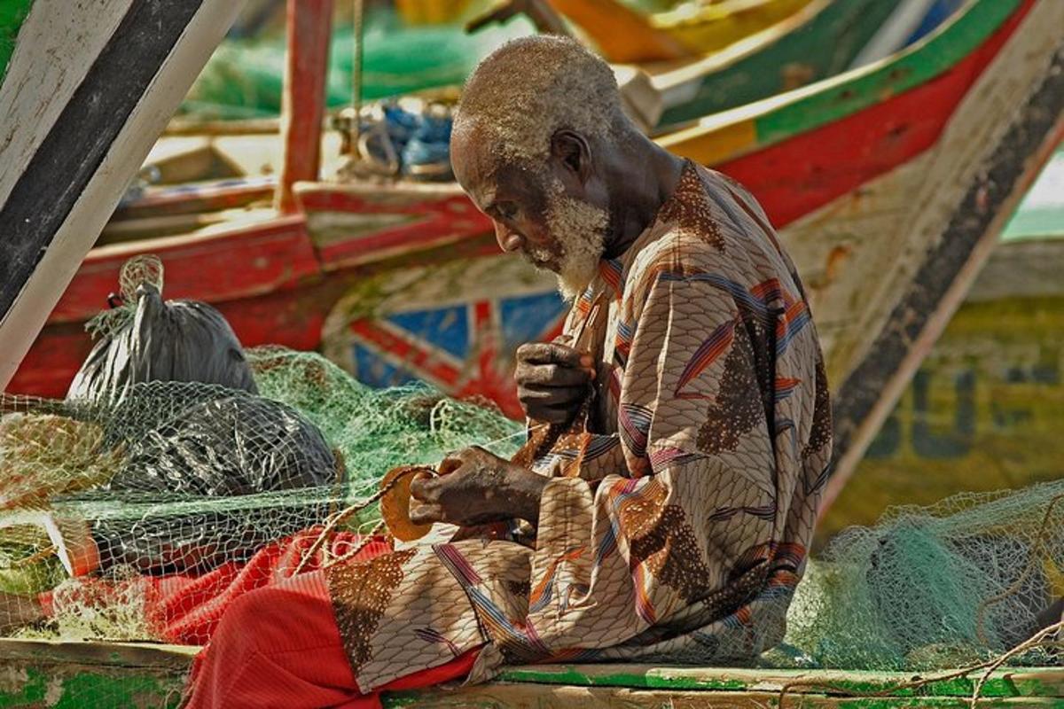 a man working on a doll in a net