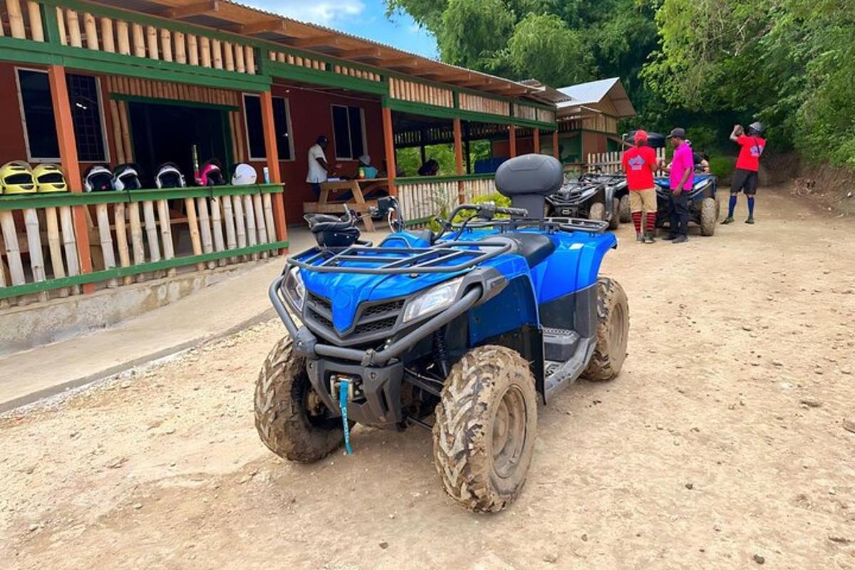 a blue four wheeler parked in front of a building