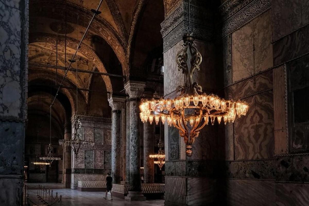 a large chandelier hanging from a wall in a building