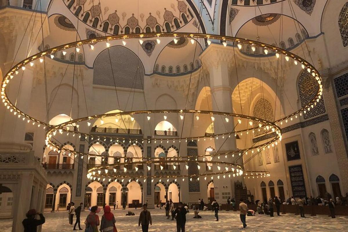 a large building with people walking around it with lights