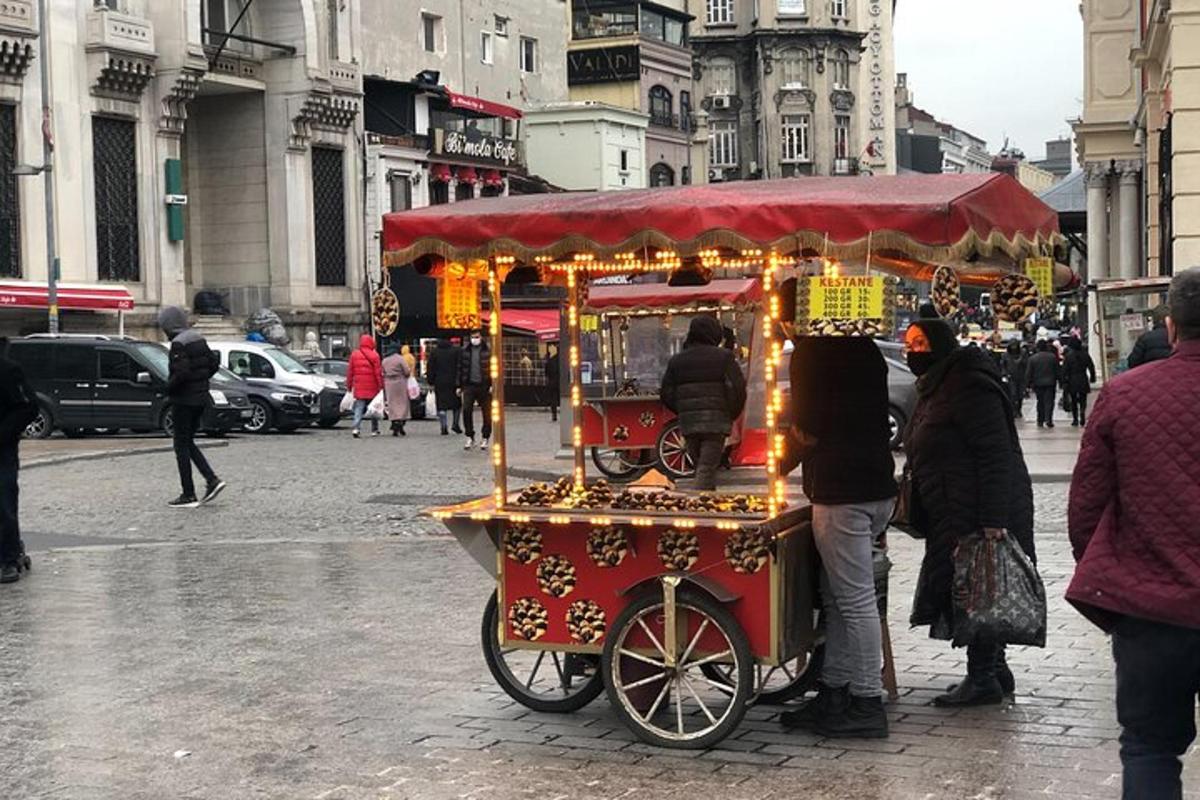 a hot dog cart on a city street