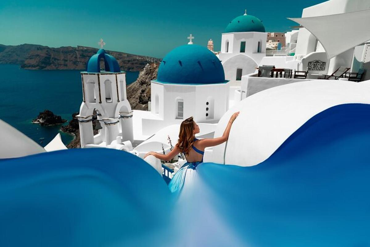 uma mulher de vestido azul sentada no topo de prédios brancos