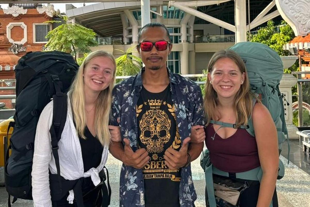 a man and two women posing for a picture