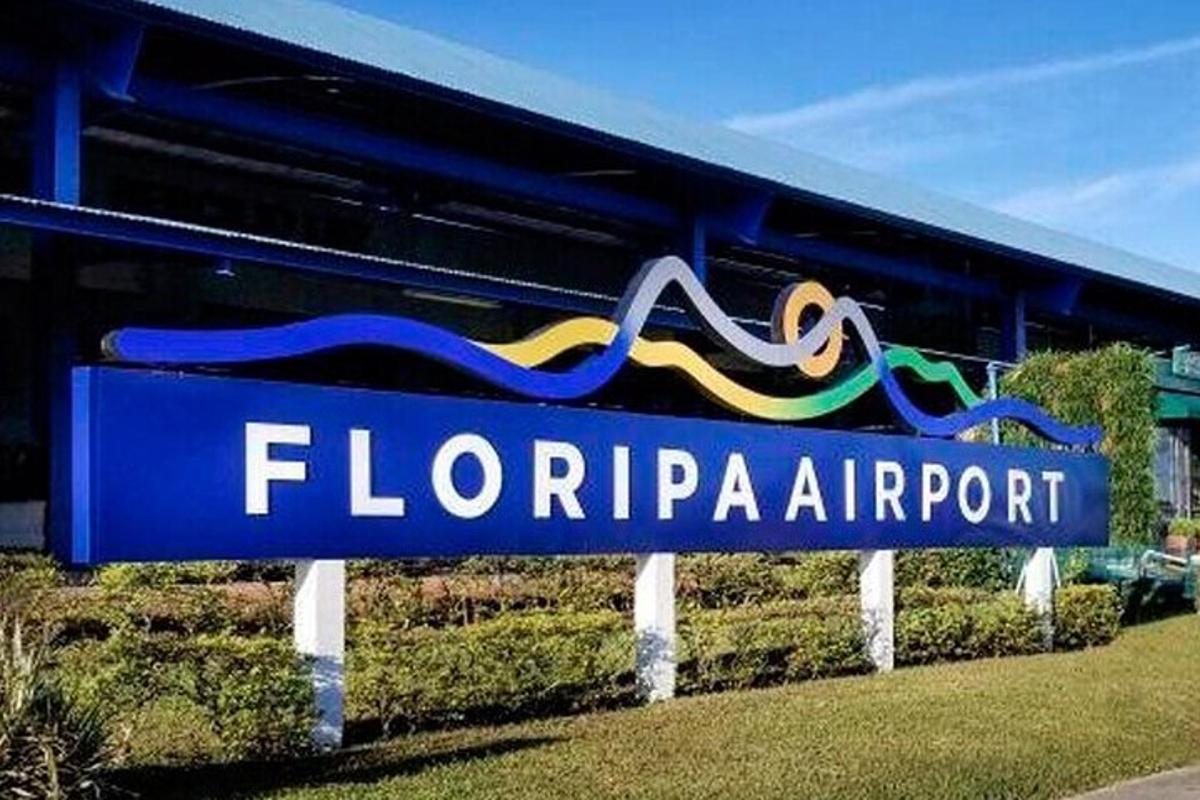 a sign for a florida air airport on the side of a building