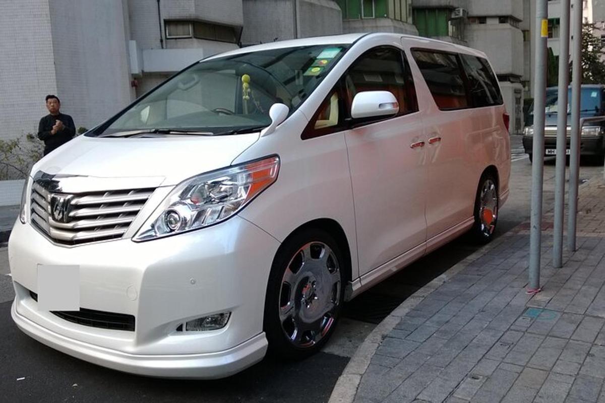 a white van parked on the side of a street