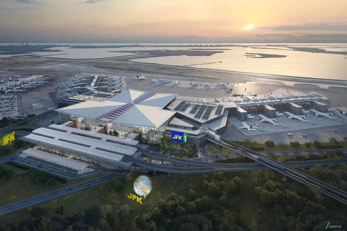 an aerial view of a large building with a highway