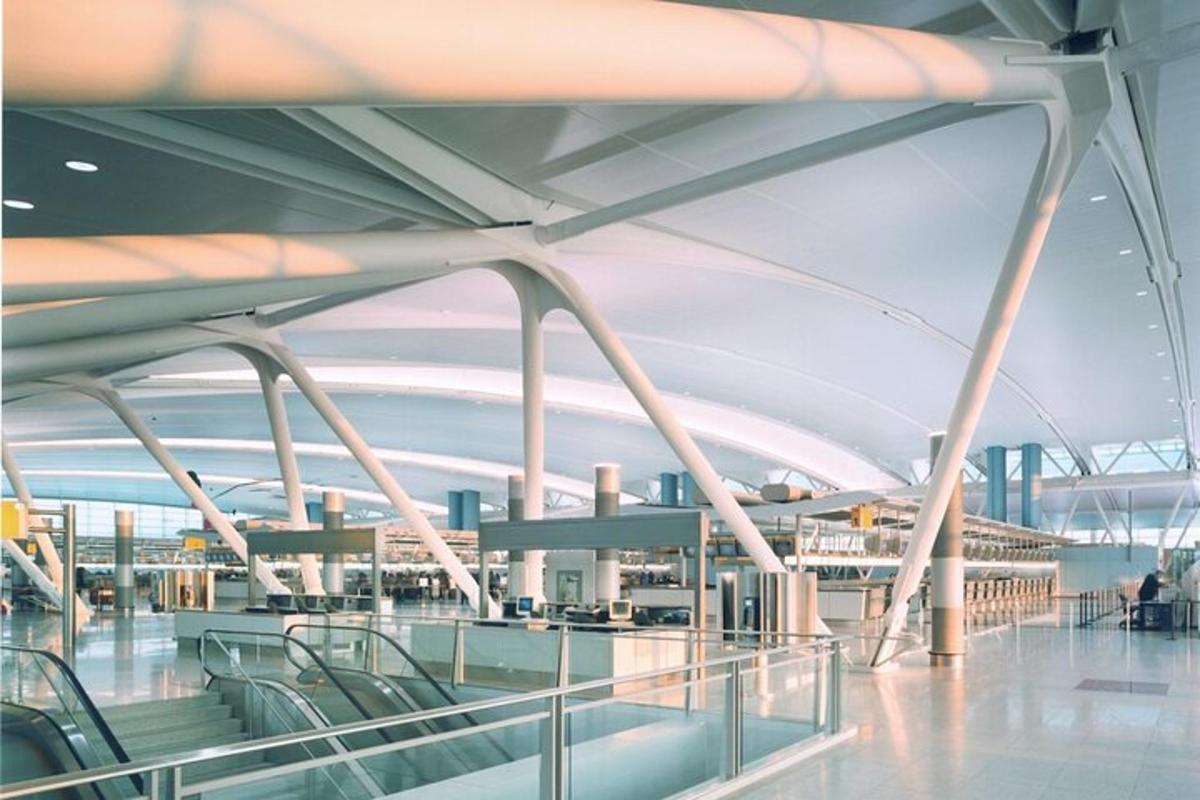 a view of an airport terminal with escalators