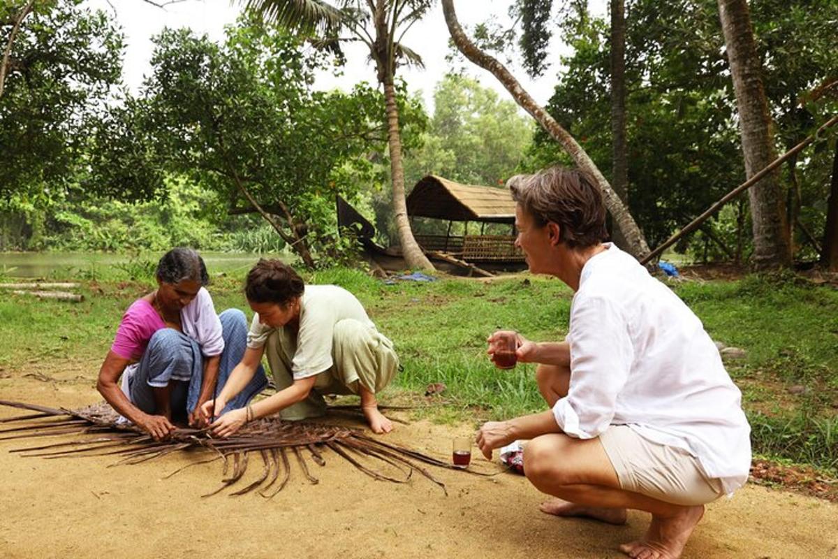 a group of people planting aire in the dirt