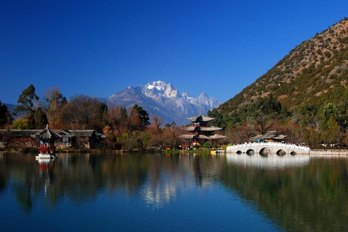 a large lake with a mountain in the background