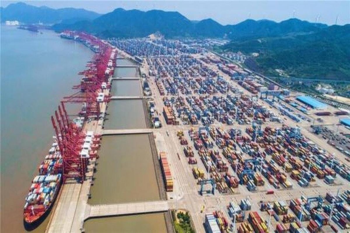 an aerial view of a large harbor with ships