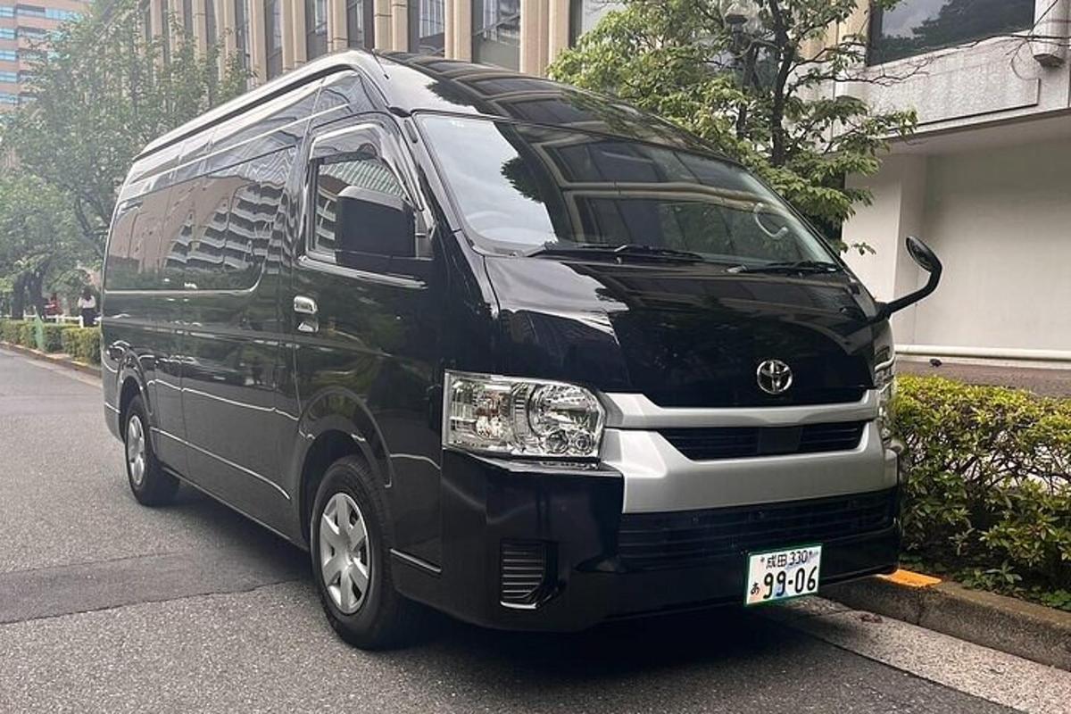 a black van parked on the side of a street