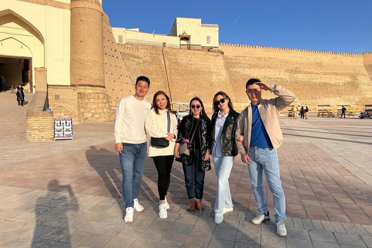 a group of people standing in front of a building